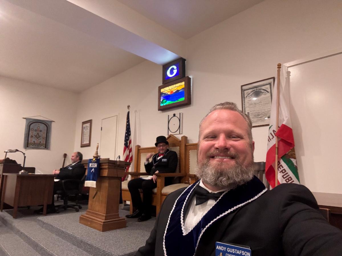 man with beard and bowtie in a lodge