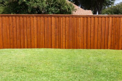 Redwood Fence behind a lawn