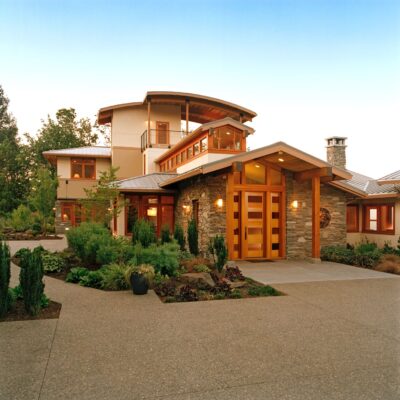wooden house and driveway house is  very nice with a grand wooden door